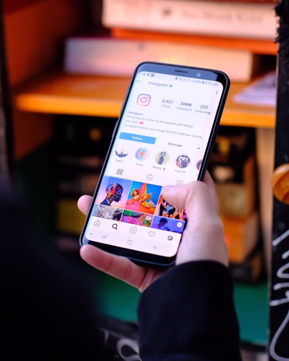 Hook Digital - Close up show of a phone showing Instagram