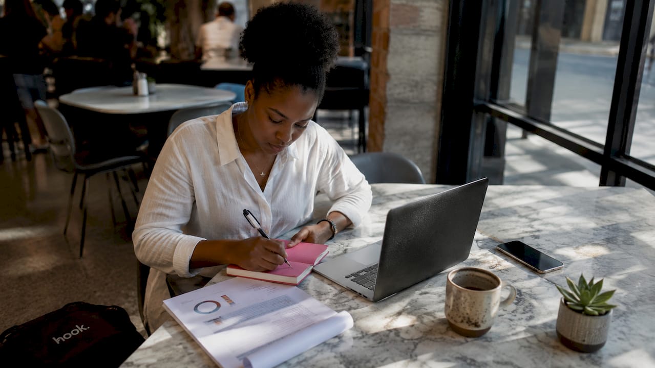 Woman planning inbound lead generation at home office