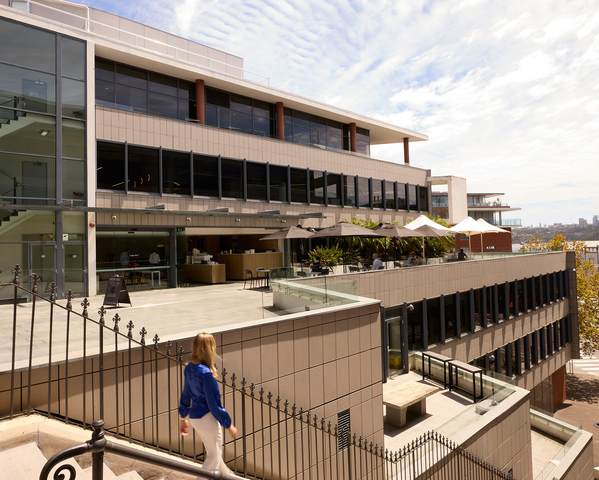 Nautilus office building at 8 Windmill Street Millers Point Australia, modern architecture with balconies overlooking Sydney Harbour.