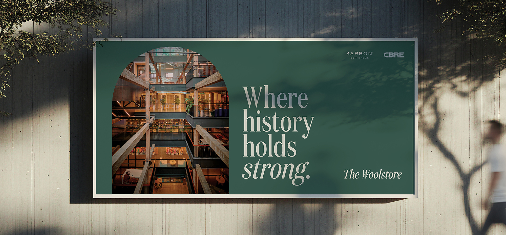 The Woolstore Pyrmont branding billboard – ‘Where history holds strong’ with heritage warehouse interiors, by Karbon Commercial and CBRE.