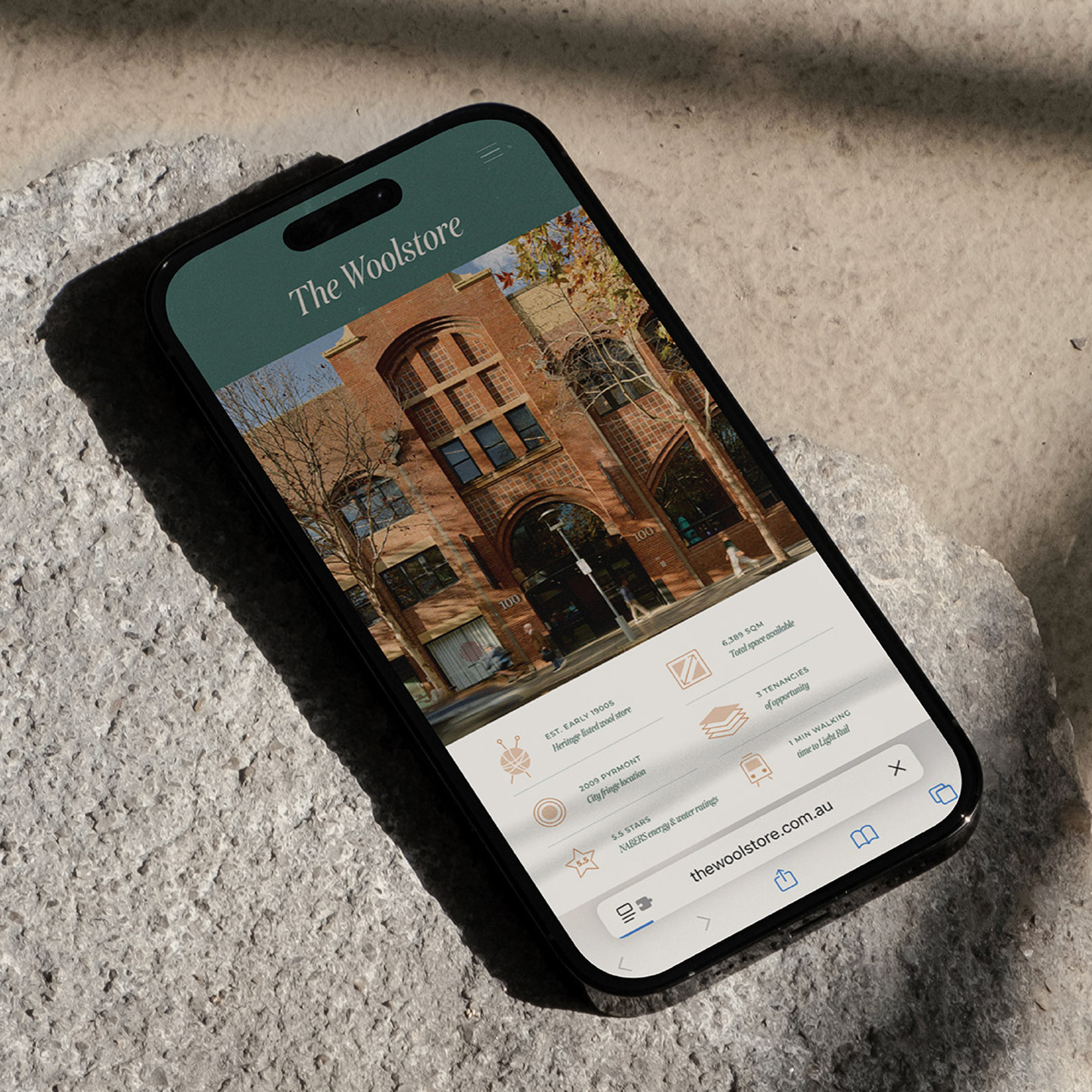 The Woolstore Pyrmont mobile website preview showcasing heritage façade and project features at 100–130 Harris Street Sydney.