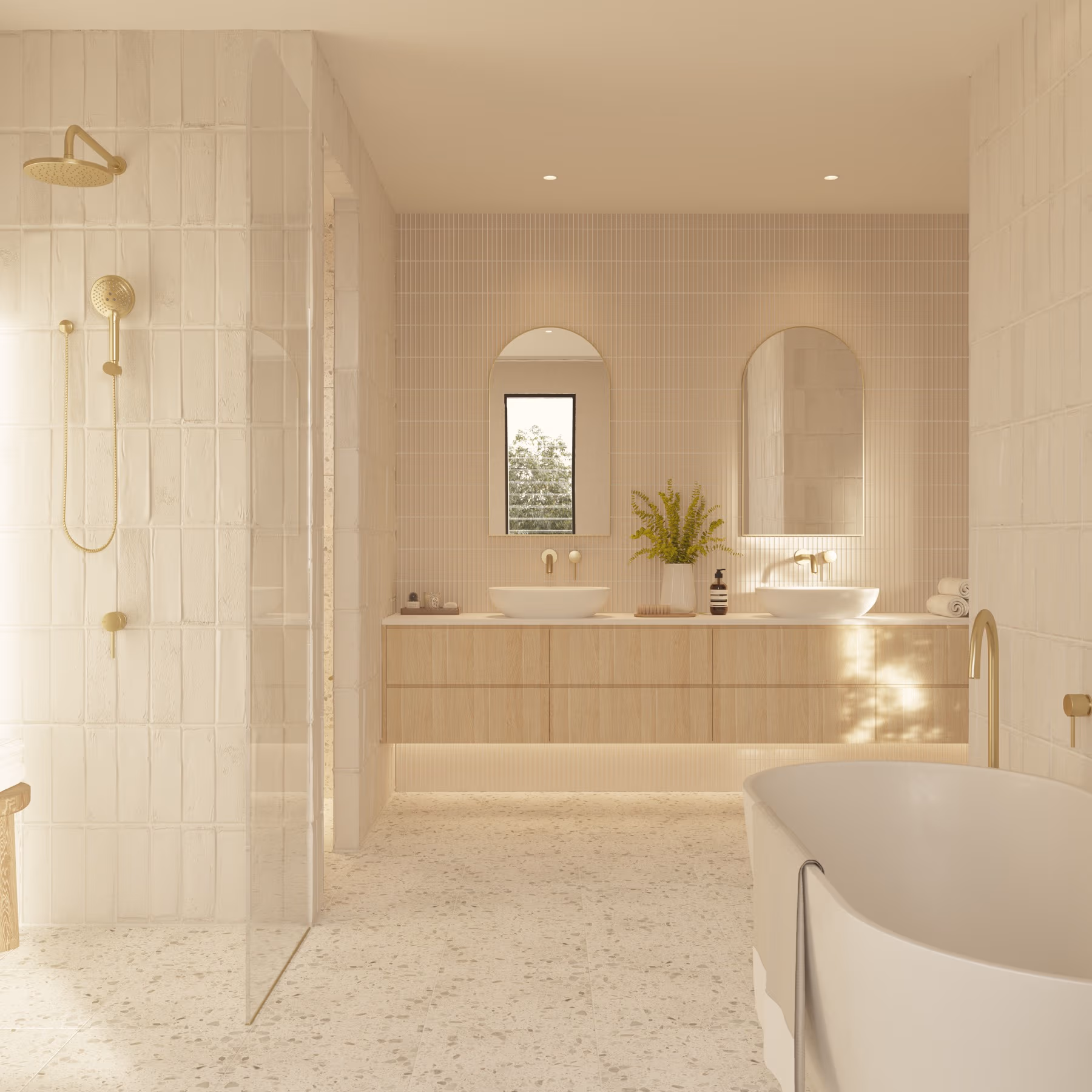 Textured neutral bathroom with custom timber vanity, terrazzo flooring, and a freestanding bathtub, designed for a premium Brisbane home.
