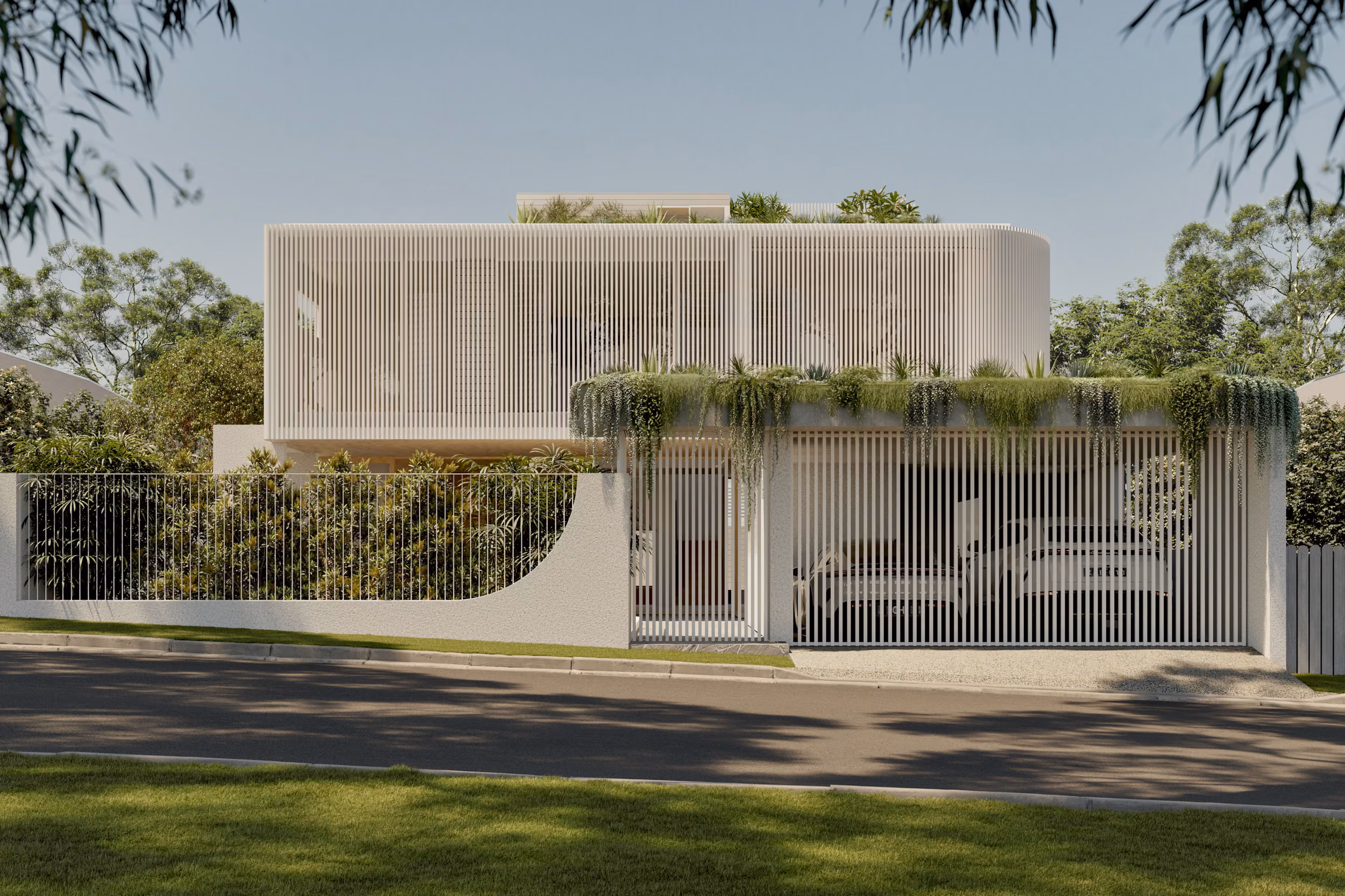 Street-facing façade of Small featuring a white vertical-louvre screen wrapping the upper volume, a gated driveway with cascading greenery, and a lush planted boundary wall