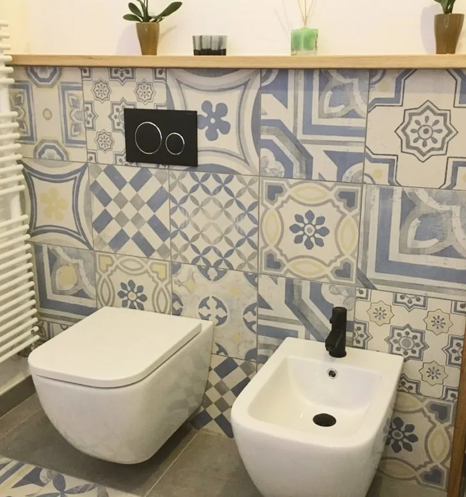 Rifacimento facciata esterna residenziale con intonaco tinteggiato in Ticino