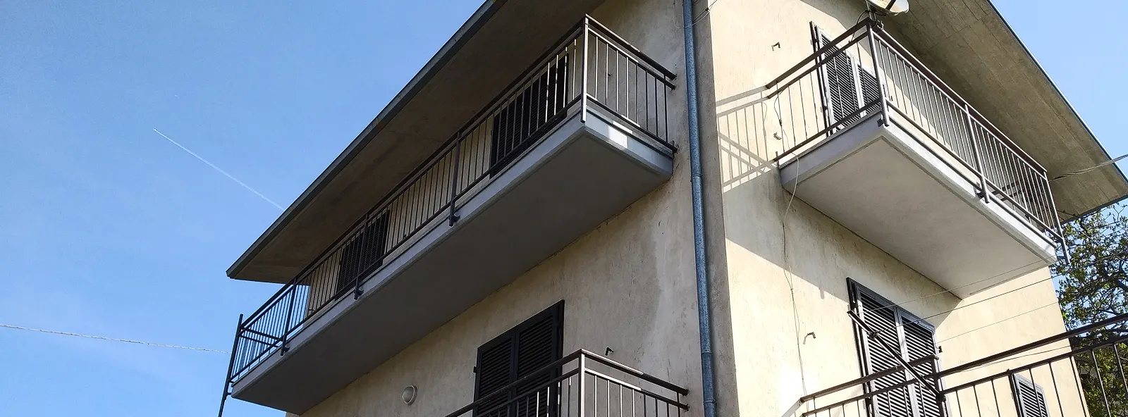 Rifacimento facciata con cappotto termico su casa residenziale in Ticino