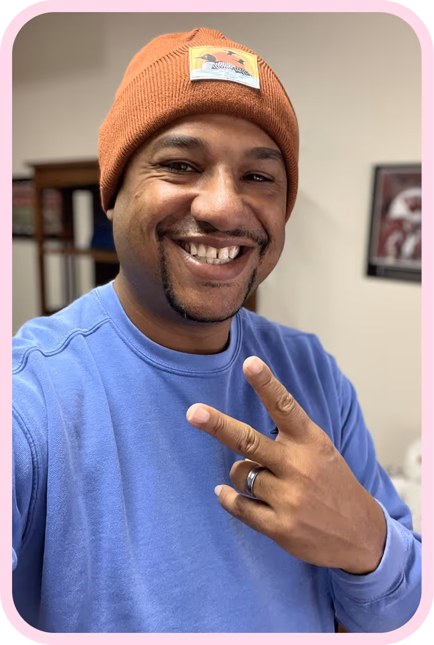 Smiling reviewer giving thumbs up