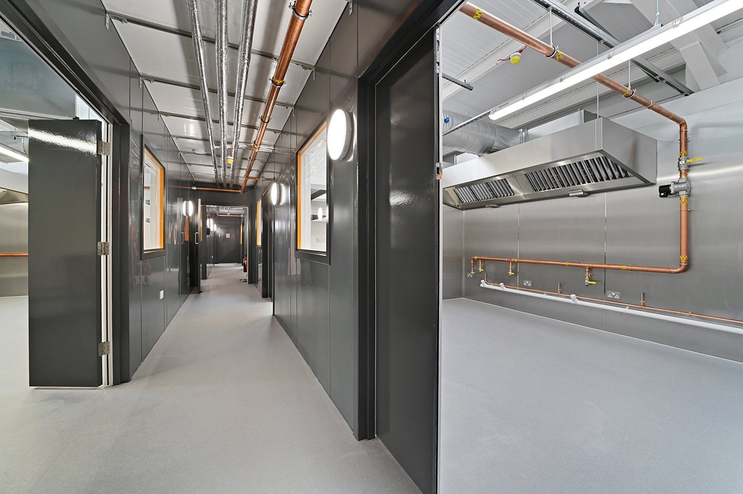 Corridor of delivery kitchens at an Encore Kitchens site