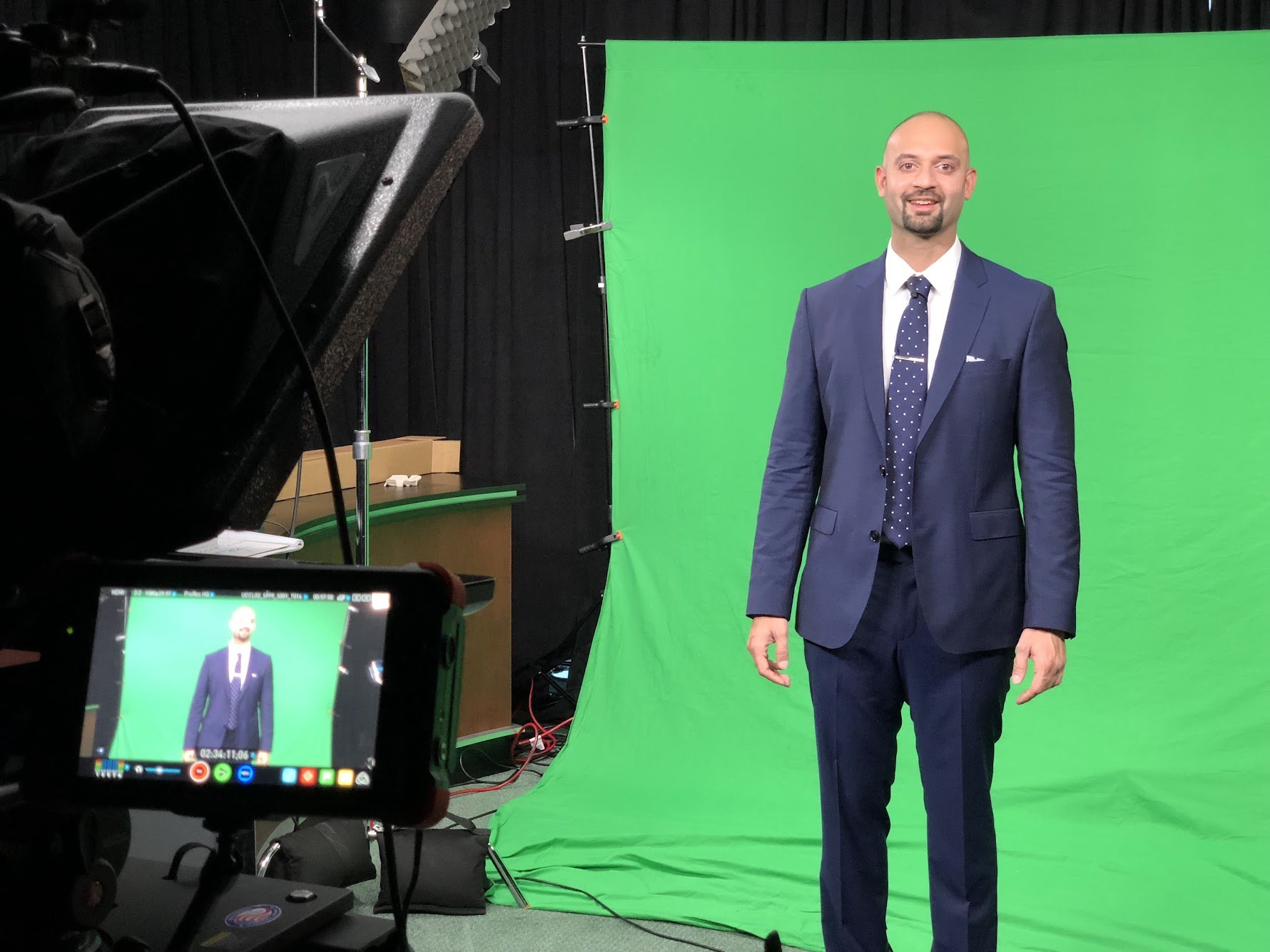 Kunal Desai filming Bulls on Wall Street online trading course content in the BOWS production studio.