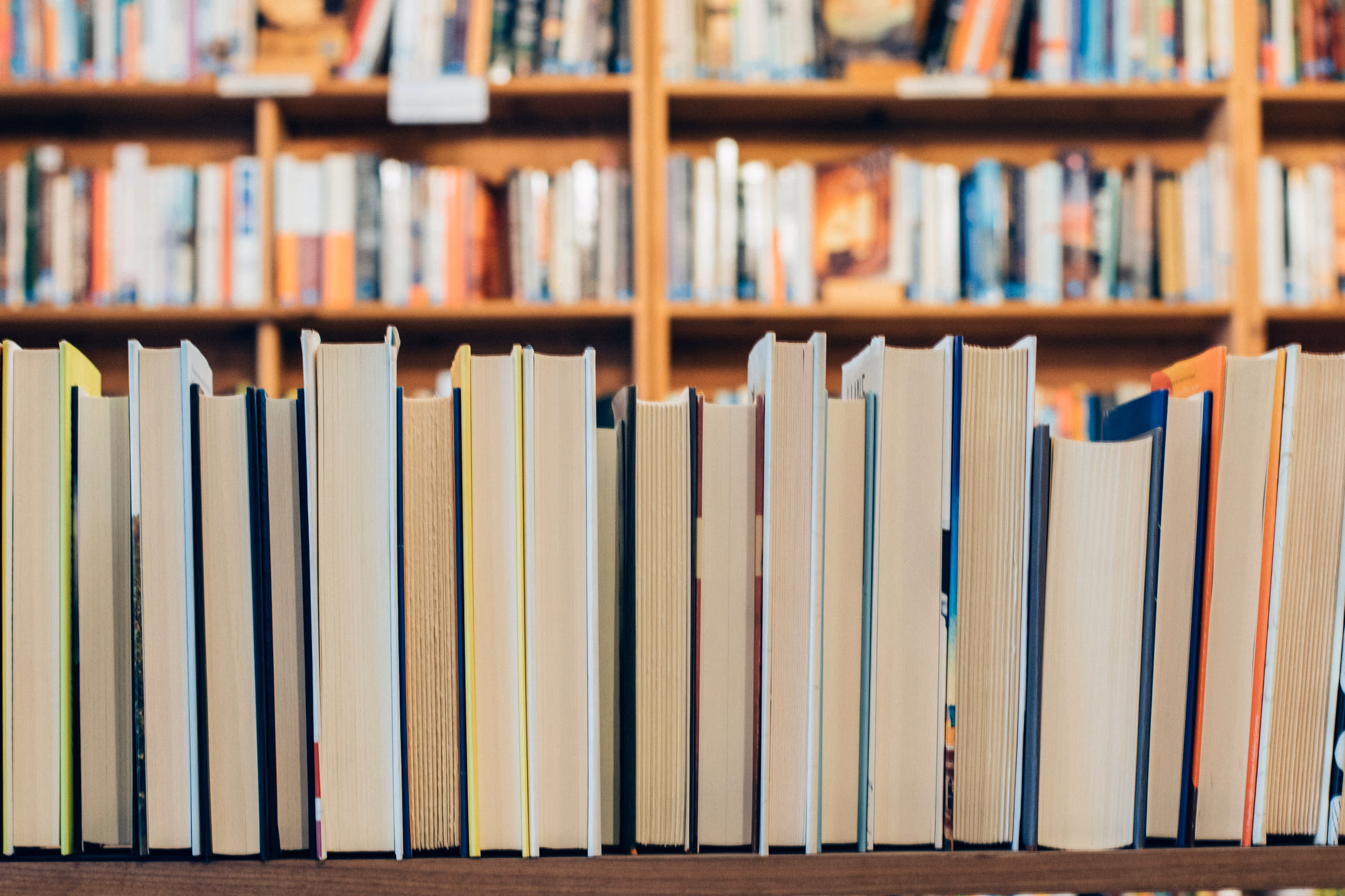 Rows of library bookshelves filled with books