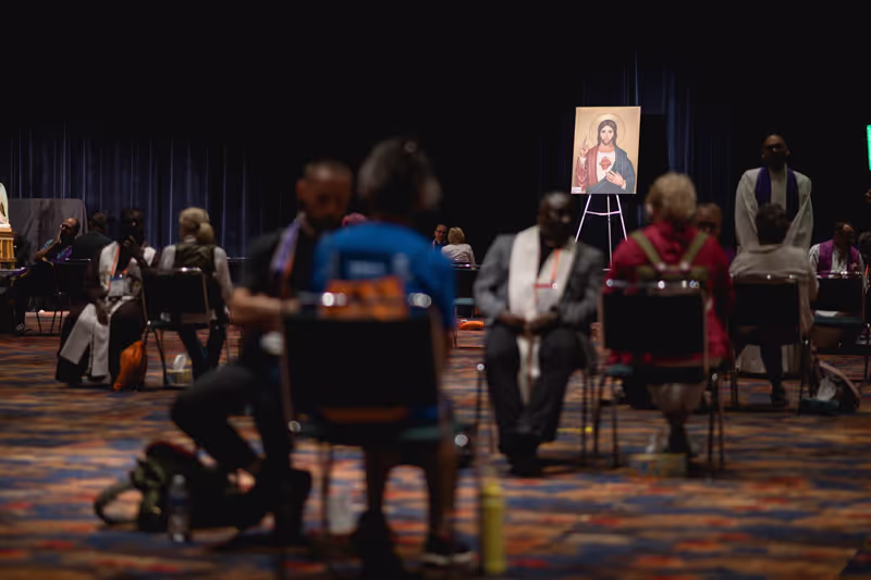 Priest hearing a confession