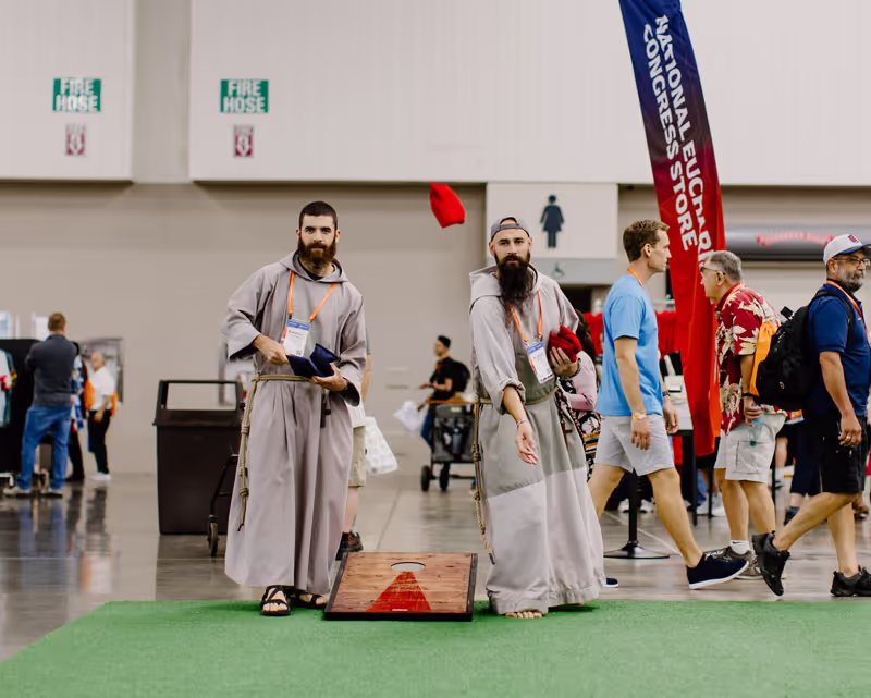 CFRs playing cornhole in the exhibit hall.