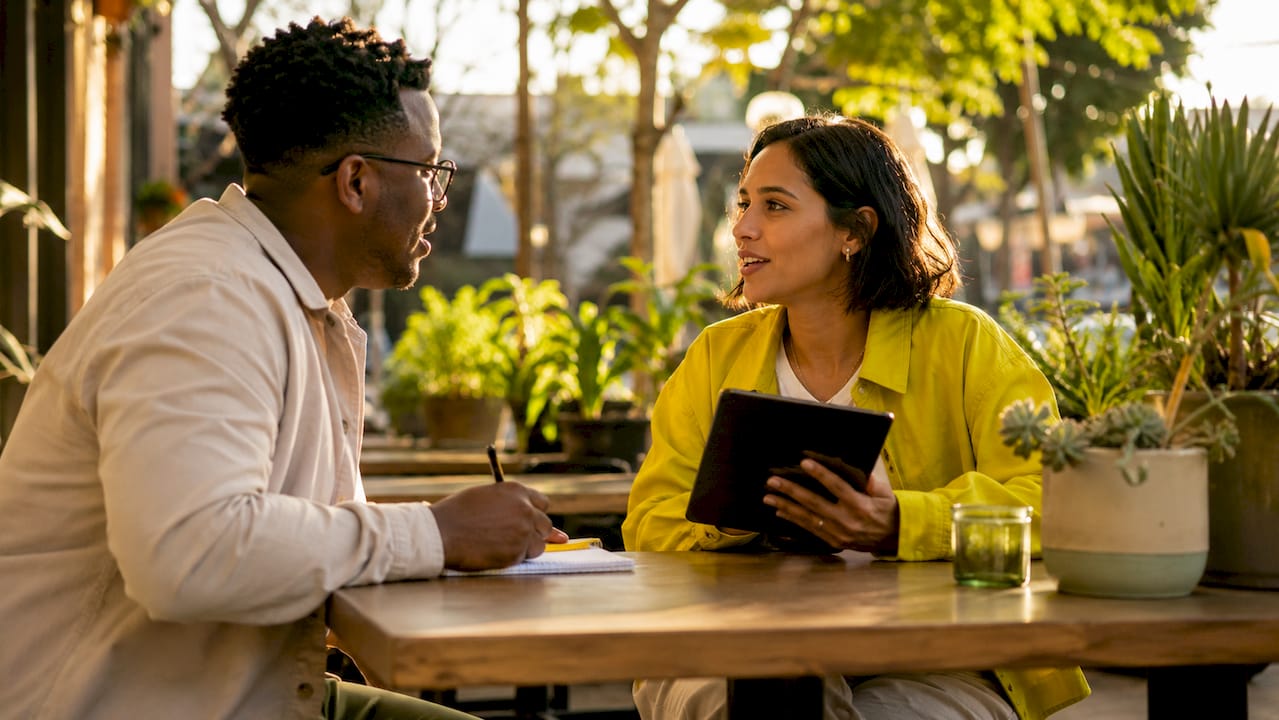 Two people practicing language tandem exchange
