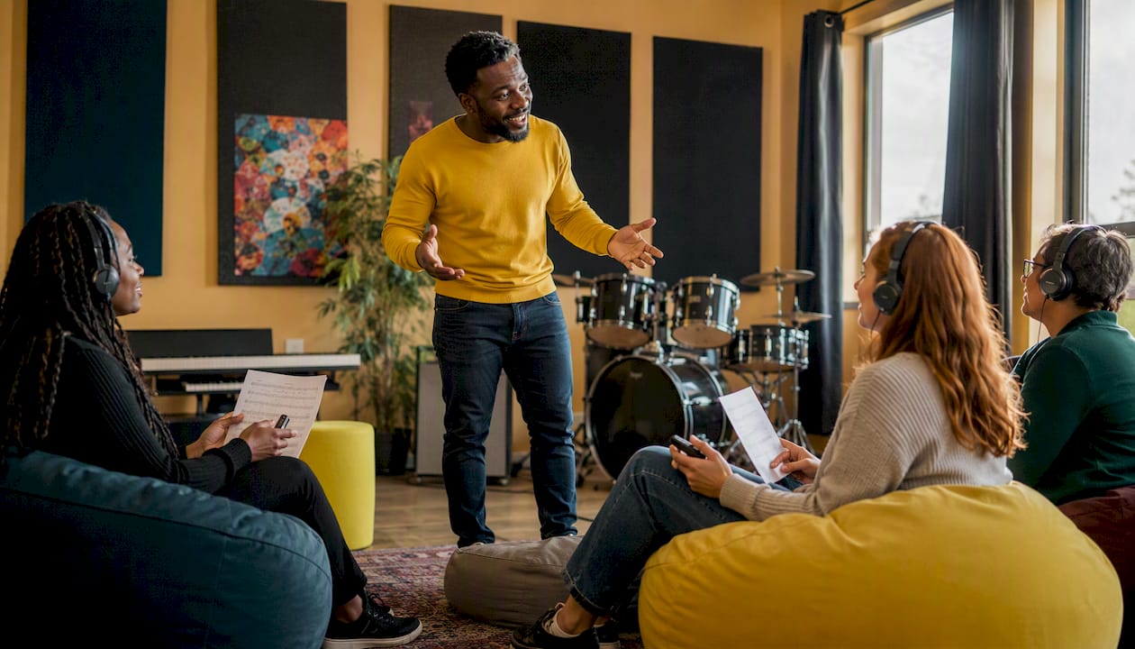 Teacher guiding music language practice group