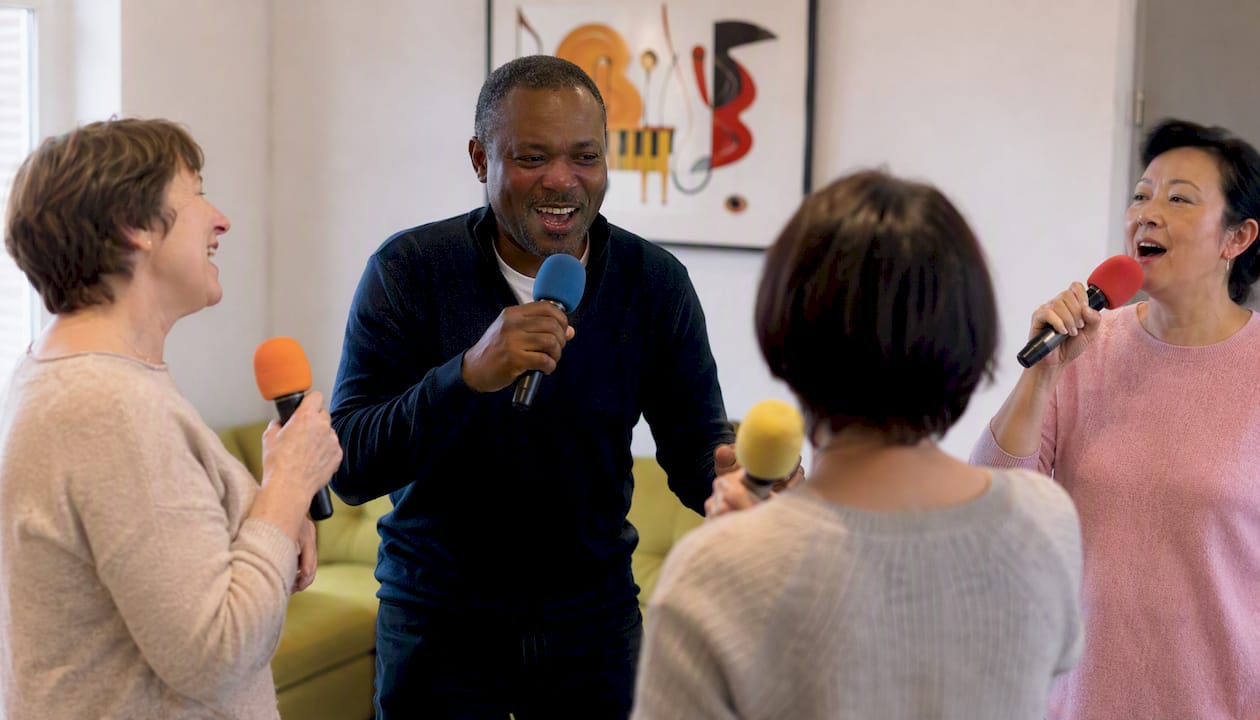 Small group singing karaoke for wellbeing