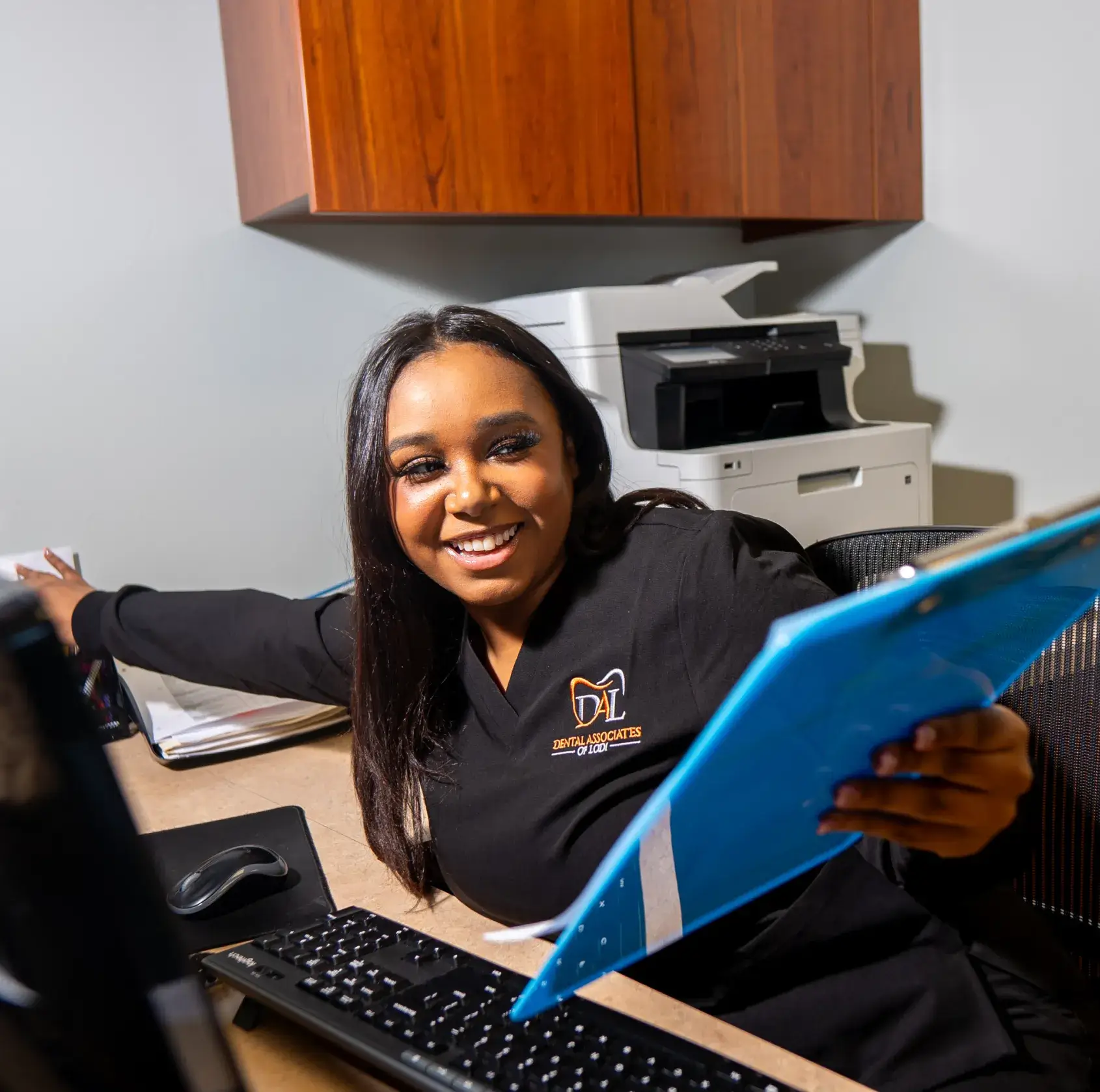 Team member handing a document