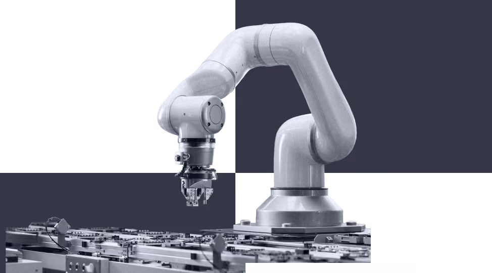 Industrial robotic arm positioned above a conveyor system in a manufacturing setting.