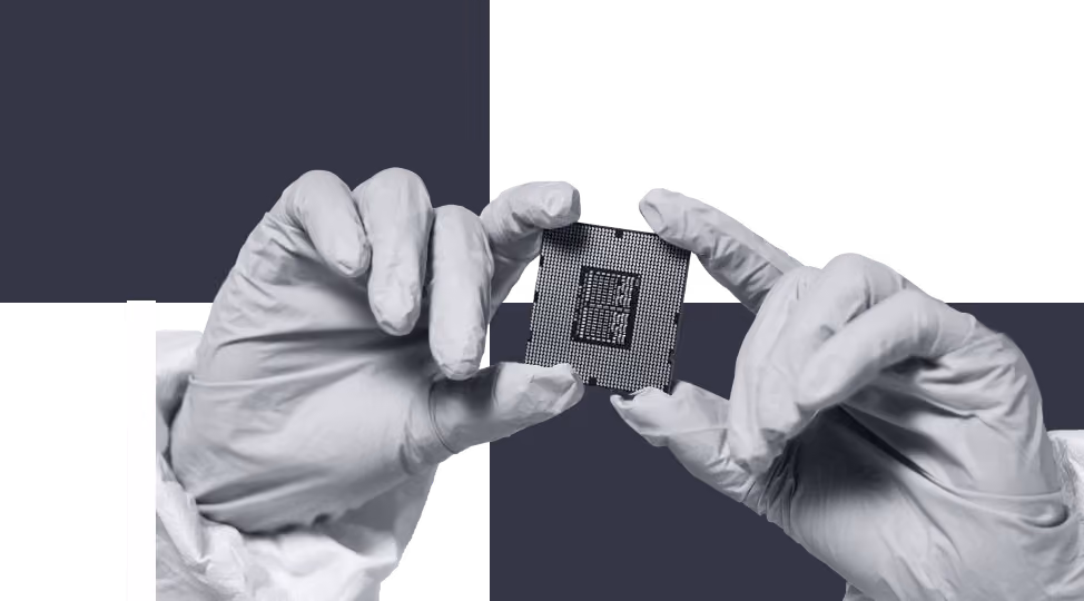 Gloved hands holding a microchip, highlighting precision in electronics handling.
