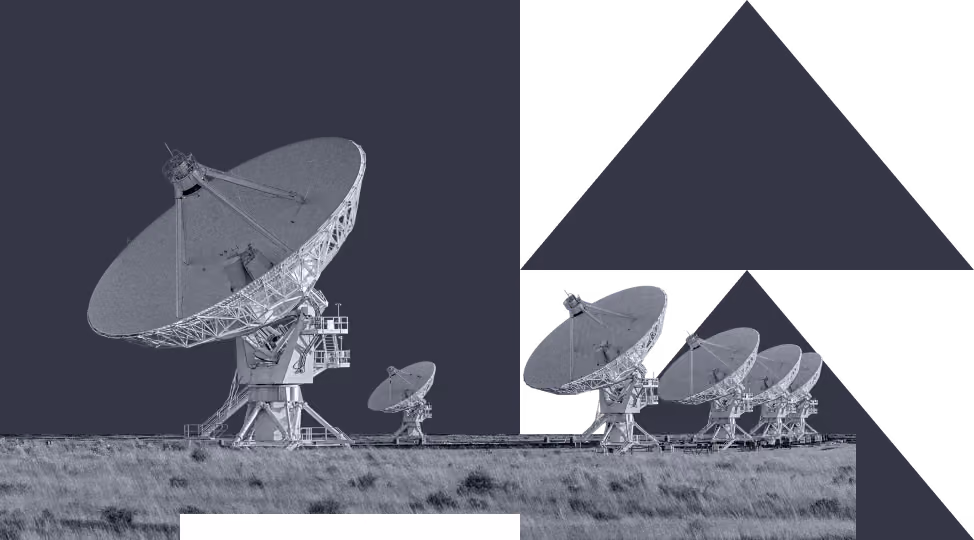 Five large satellite dishes on a grassy field under a dark sky with arrow shapes in the background.