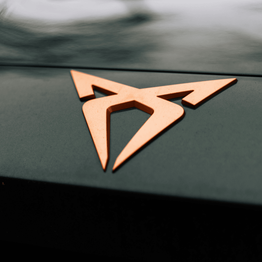 Call center worker wearing Jabra headset smiling at workplace