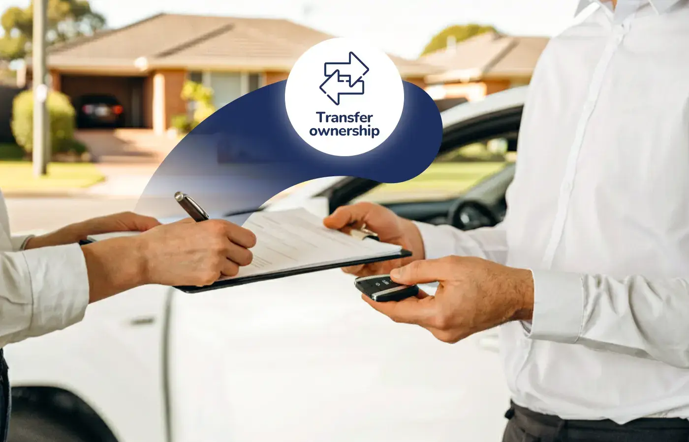 Buyer and seller completing car ownership transfer paperwork while exchanging keys.