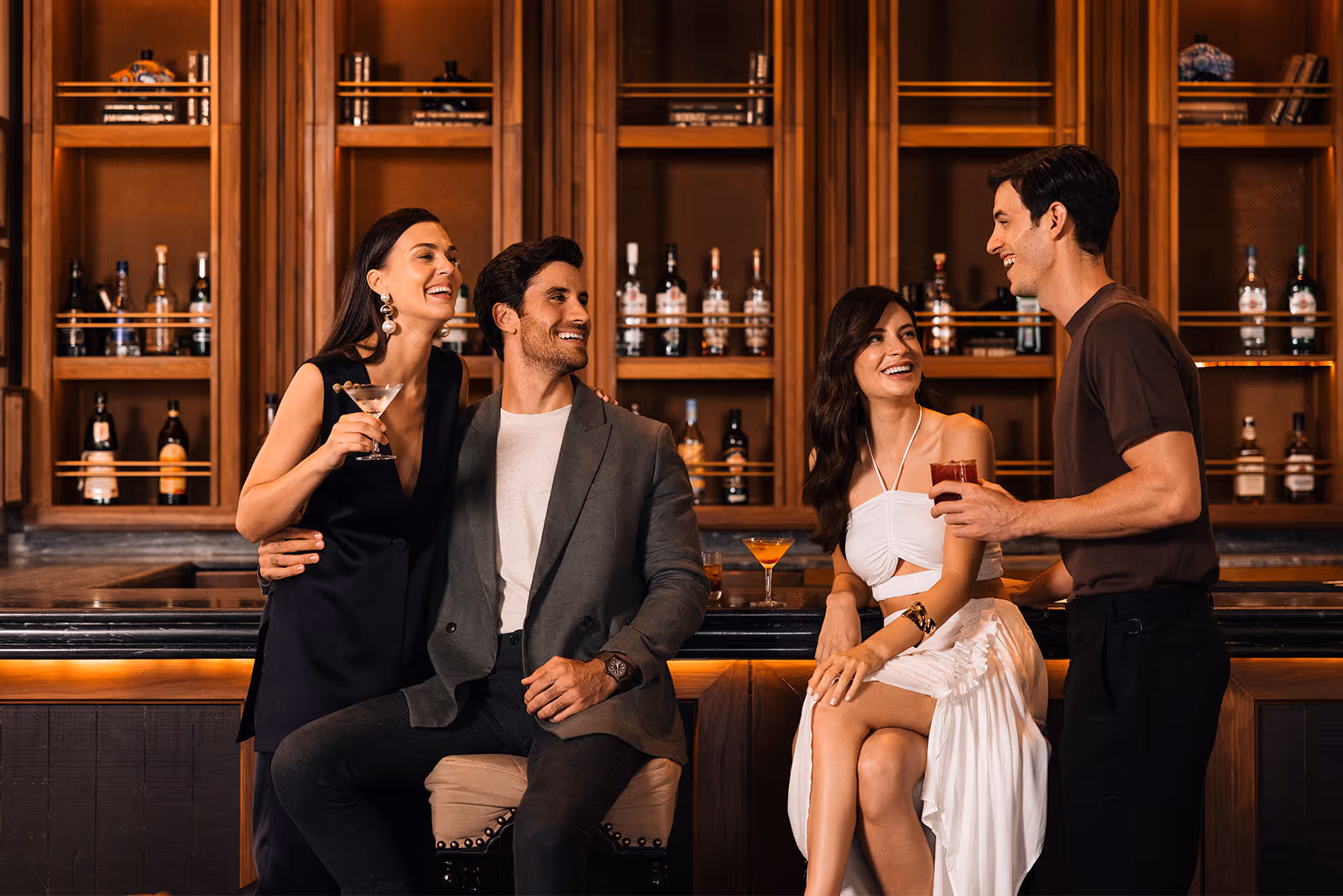 a group of people sitting in a bar