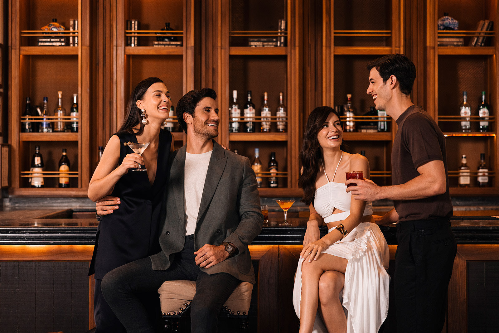 a group of people sitting in a bar