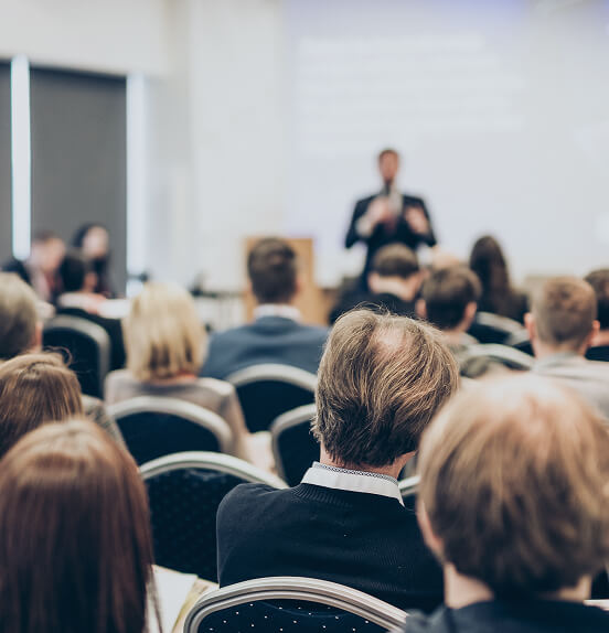 Group of people attending a conference.