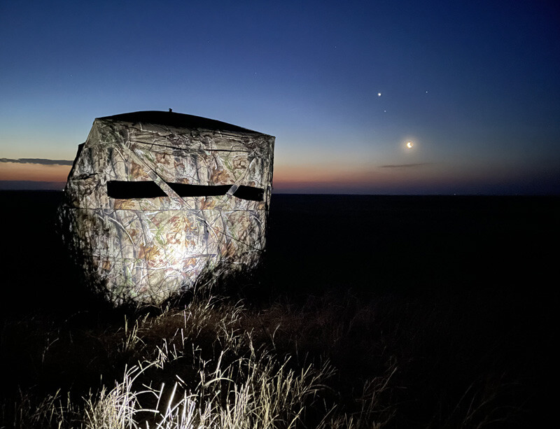 Exterior view of a blind during the pre-daylight hours of a grouse tour