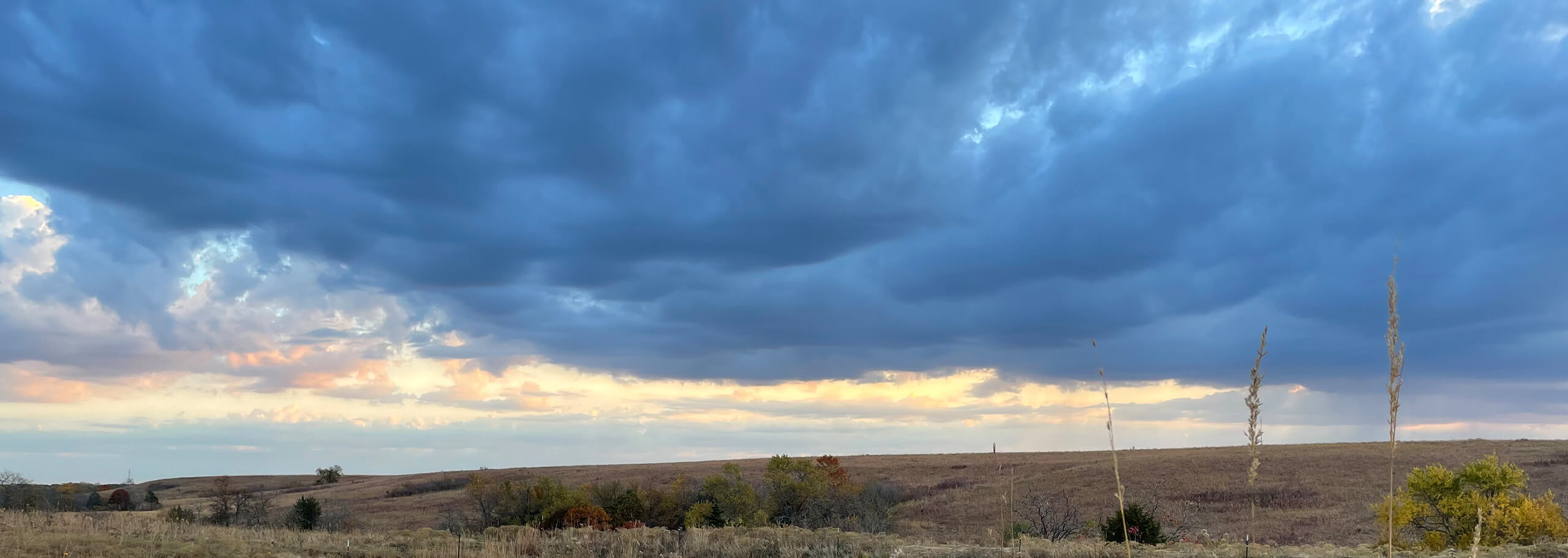 Cloudy prairie skies