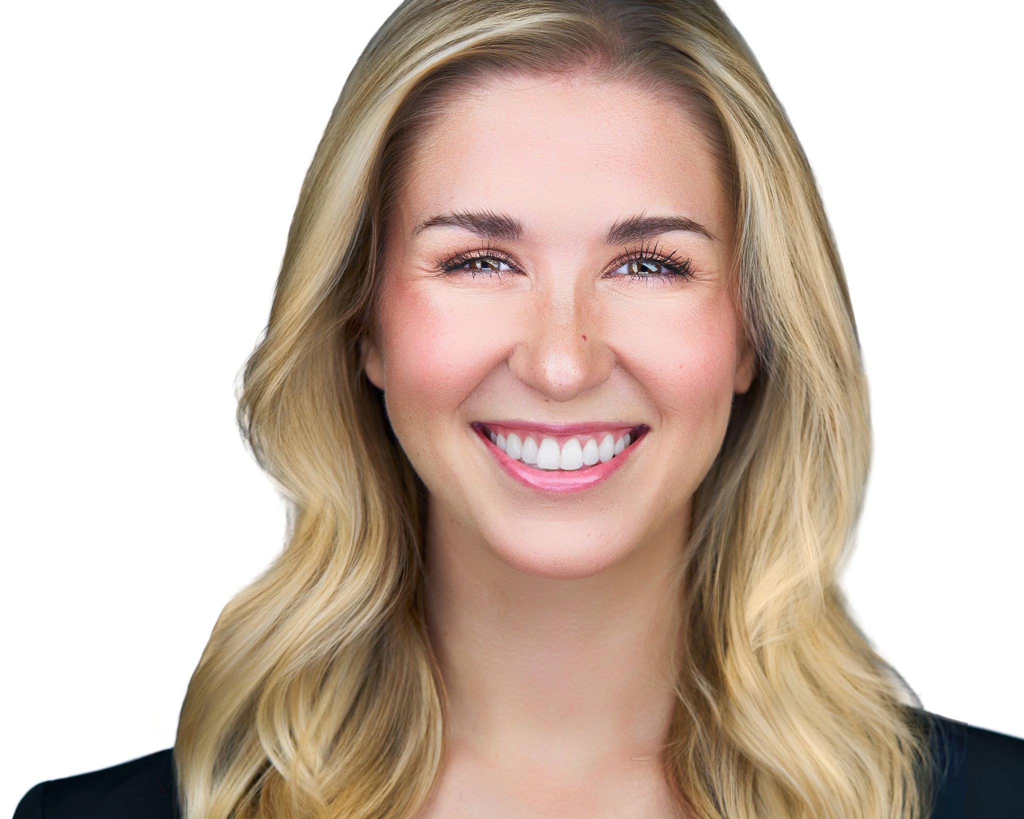 On-Location Corporate Headshots at On Site Headshots made for a corporate group headshot session — white female with long blonde hair and a bright smile, wearing a light top