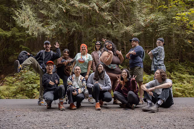Behind the scenes of the Merrell x Unlikely Hikers shoot, Mt. Hood National Park. Photo of the team smiling and being goofy.