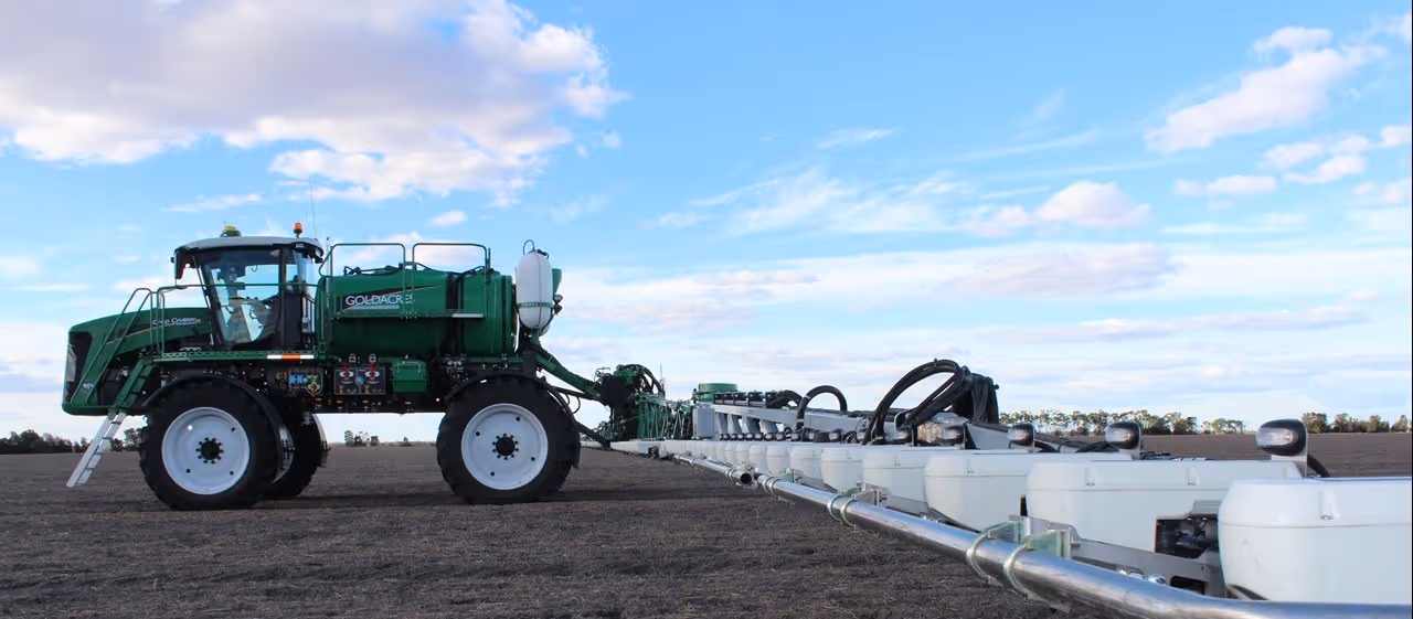 Broadacre farming equipment operating in off-grid conditions, highlighting potential for solar and battery energy systems from PHNXX