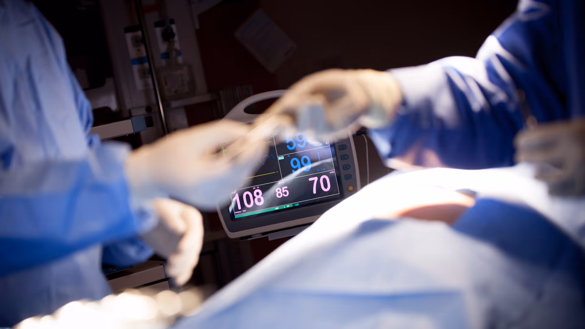 Hands on a surgical patient