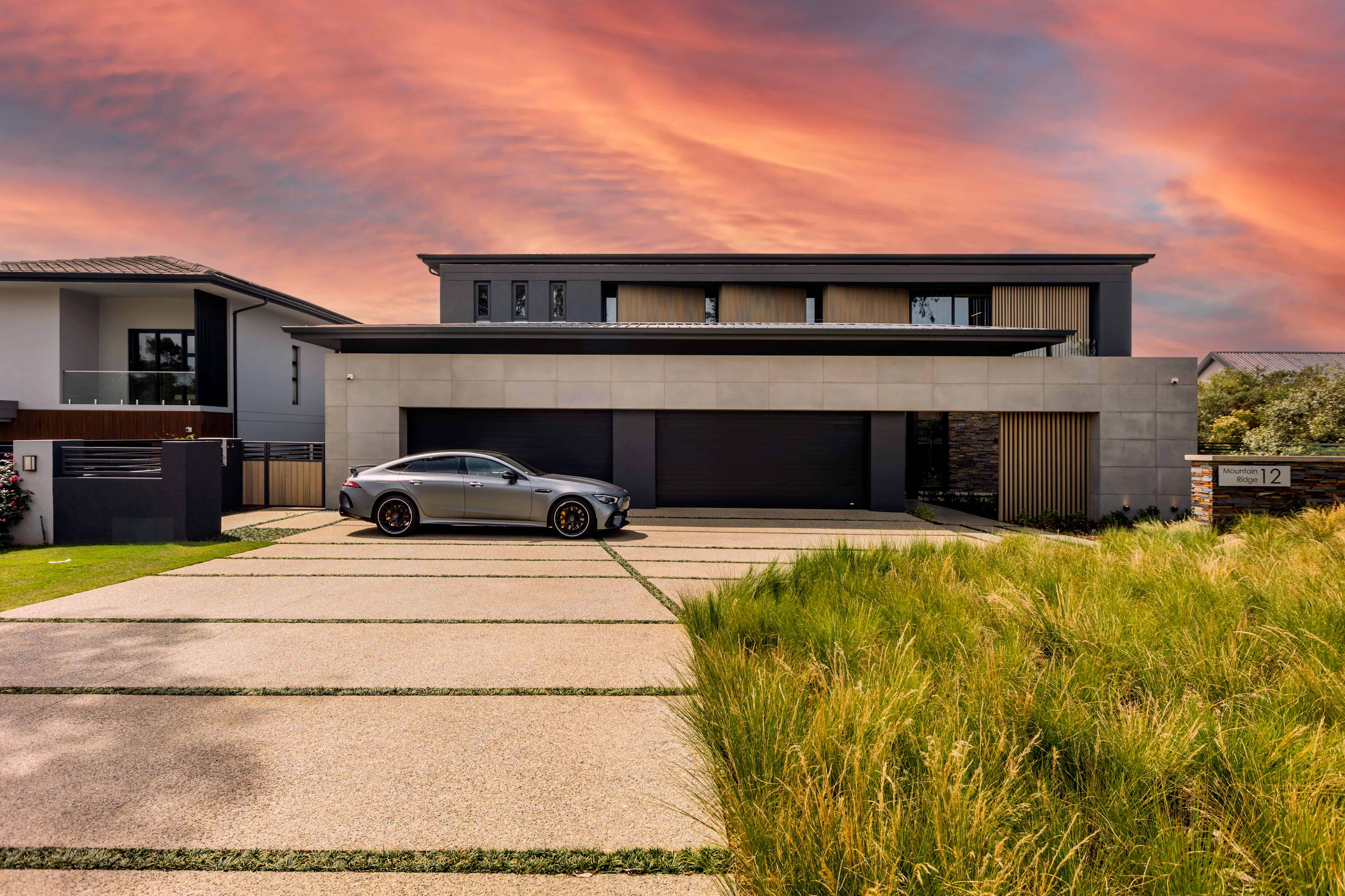 Modern luxury home exterior at sunset designed by Renovatio Interior Design, Johannesburg.