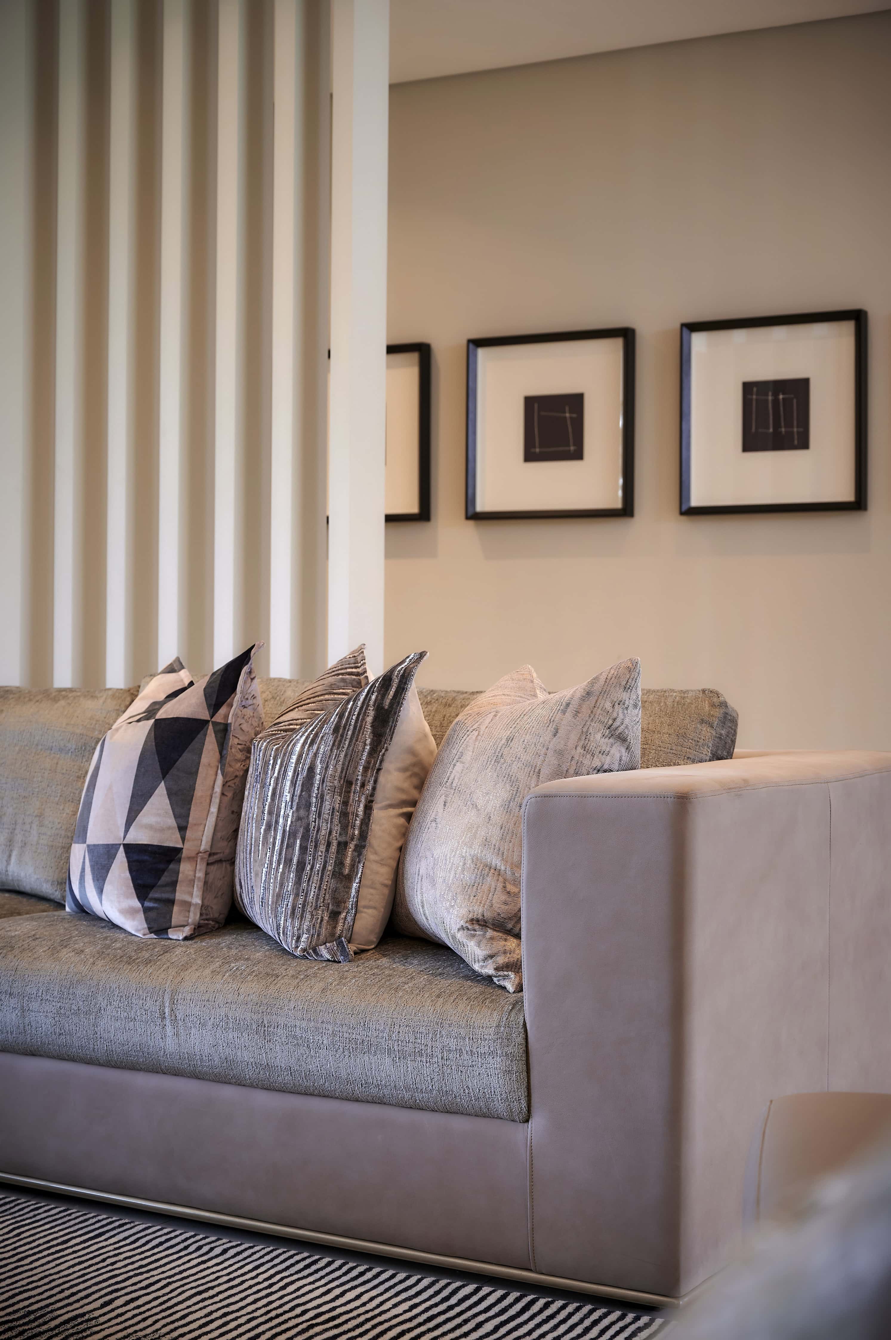 Tasteful bedroom design featuring warm lighting and wooden accents by Interior Designer Johannesburg.