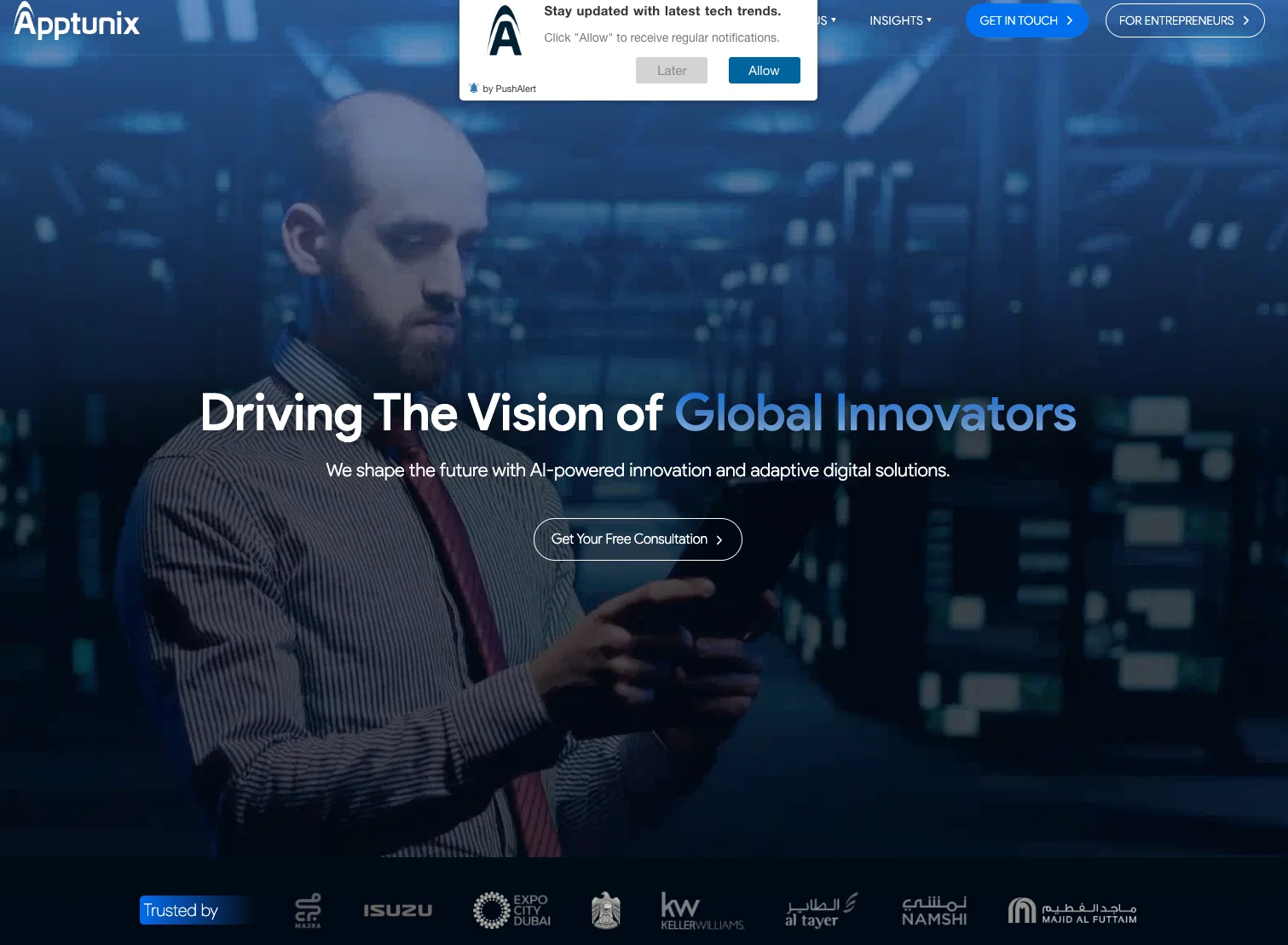 Apptunix homepage featuring Driving the Vision of Global Innovators with tech imagery.