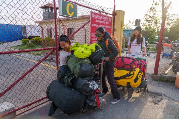 Lhakpa, center, arriving in Kathmandu, Nepal, in May after summiting Mount Everest for the 10th time. Credit: Niranjan Shrestha/Associated Press