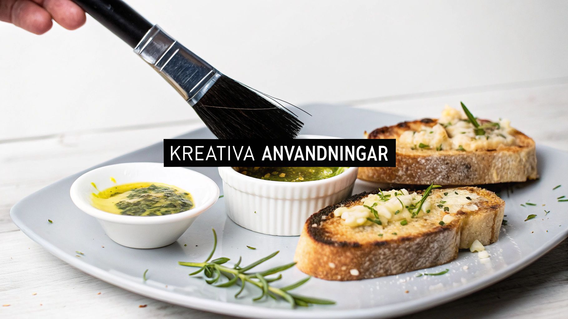 En pensel doppas i en skål med grön örtolja för att smaksätta rostat bröd.