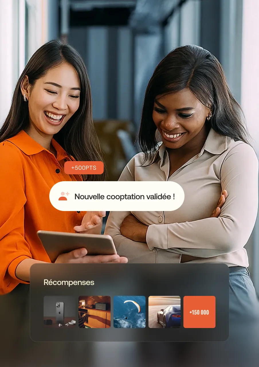 Two women smiling and looking at a tablet, with on-screen rewards points and icons showing gifts including a phone, speaker, paragliding, and car.