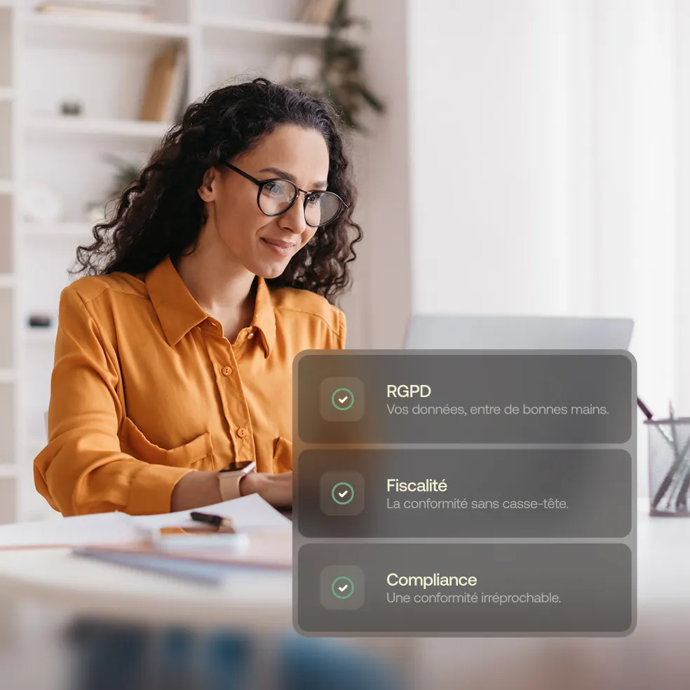 Woman with curly hair and glasses in an orange shirt working at a desk with a laptop and a translucent overlay listing RGPD, Fiscalité, and Compliance with checkmarks.