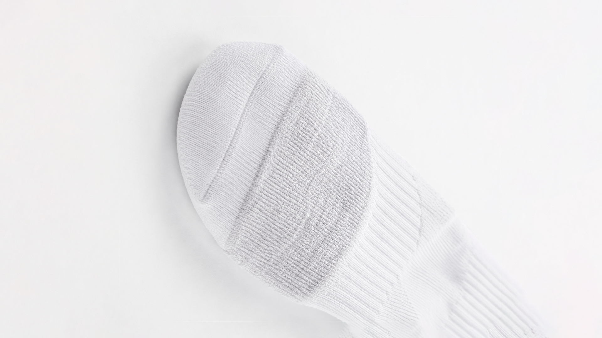 Team sock with extra cushioning at midfoot and heel