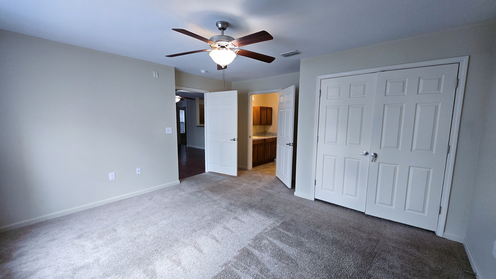 Unfurnished bedroom with carpet