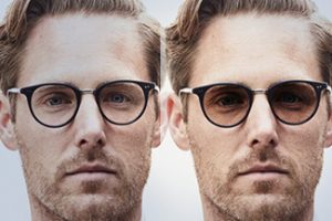 man wearing transition lenses