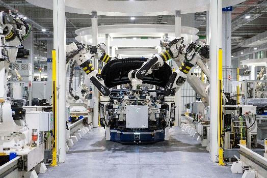 Une image contenant machine, ingénierie, intérieur, industrie