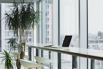 Section titled 'Integrated with the tools you use' showcasing agency management systems Momentum, EZLynx, QQCatalyst, and HawkSoft with brief descriptions and learn more links.