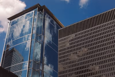 Section titled 'Integrated with the tools you use' showcasing agency management systems Momentum, EZLynx, QQCatalyst, and HawkSoft with brief descriptions and learn more links.