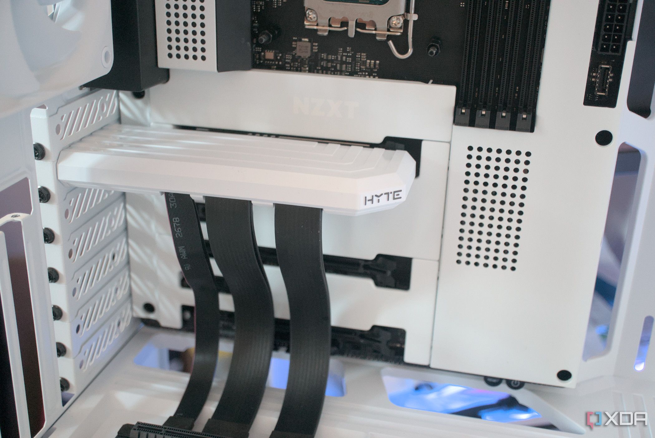 A desktop PC with a clean, minimalist white case and tidy cables.