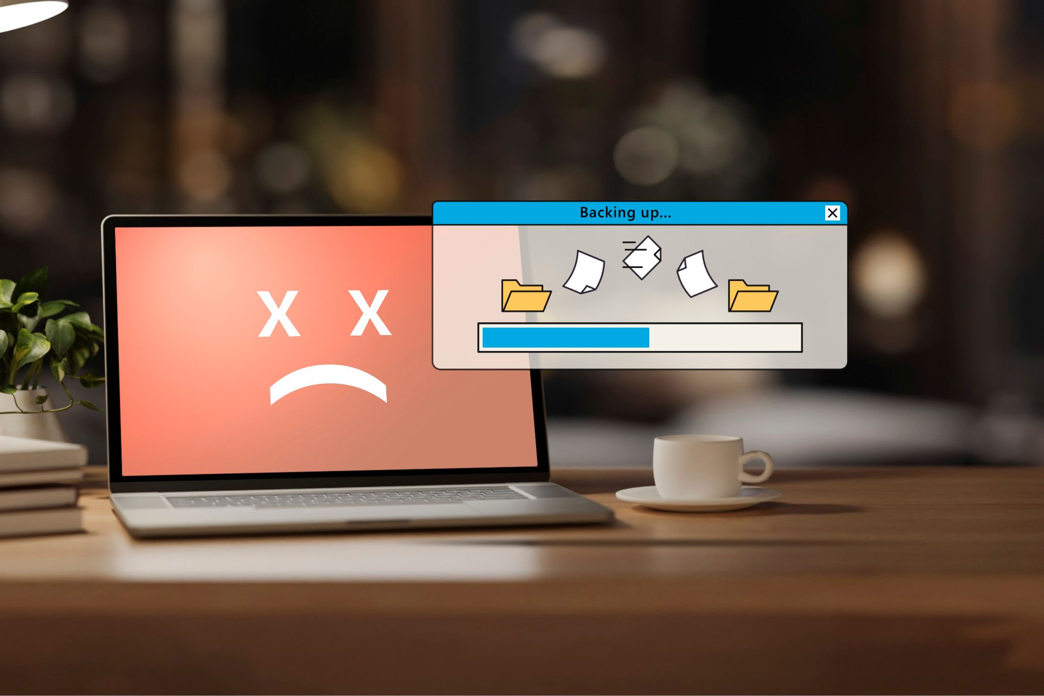 A nonfunctional laptop with a backup recovery screen open.