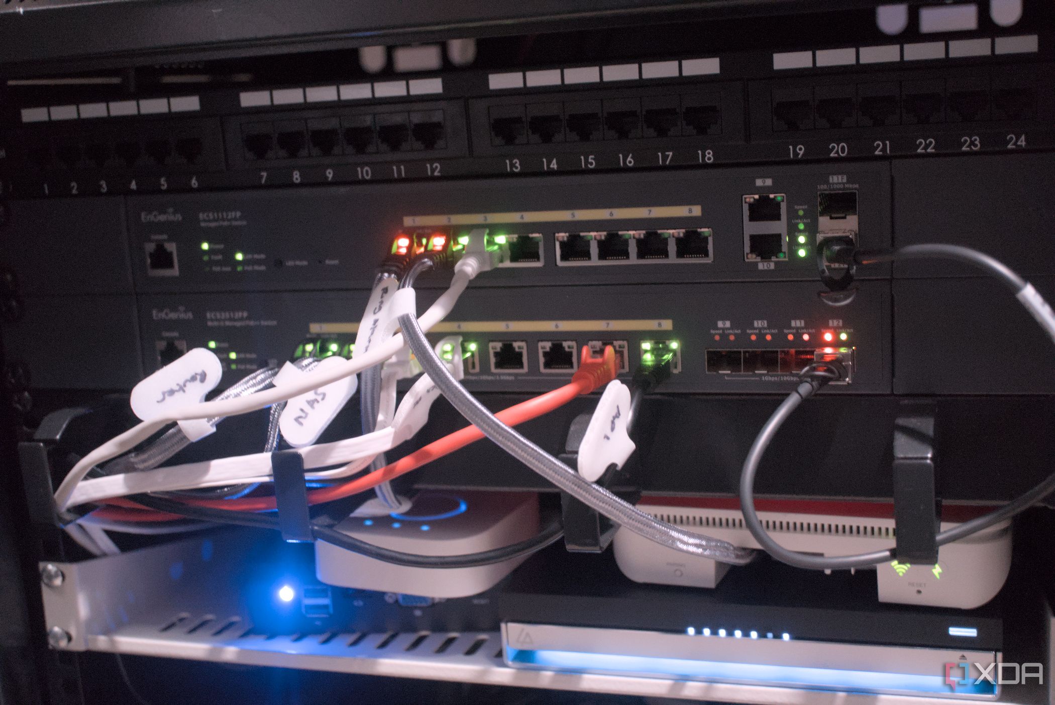 A close-up of network switches in a cabinet setup.