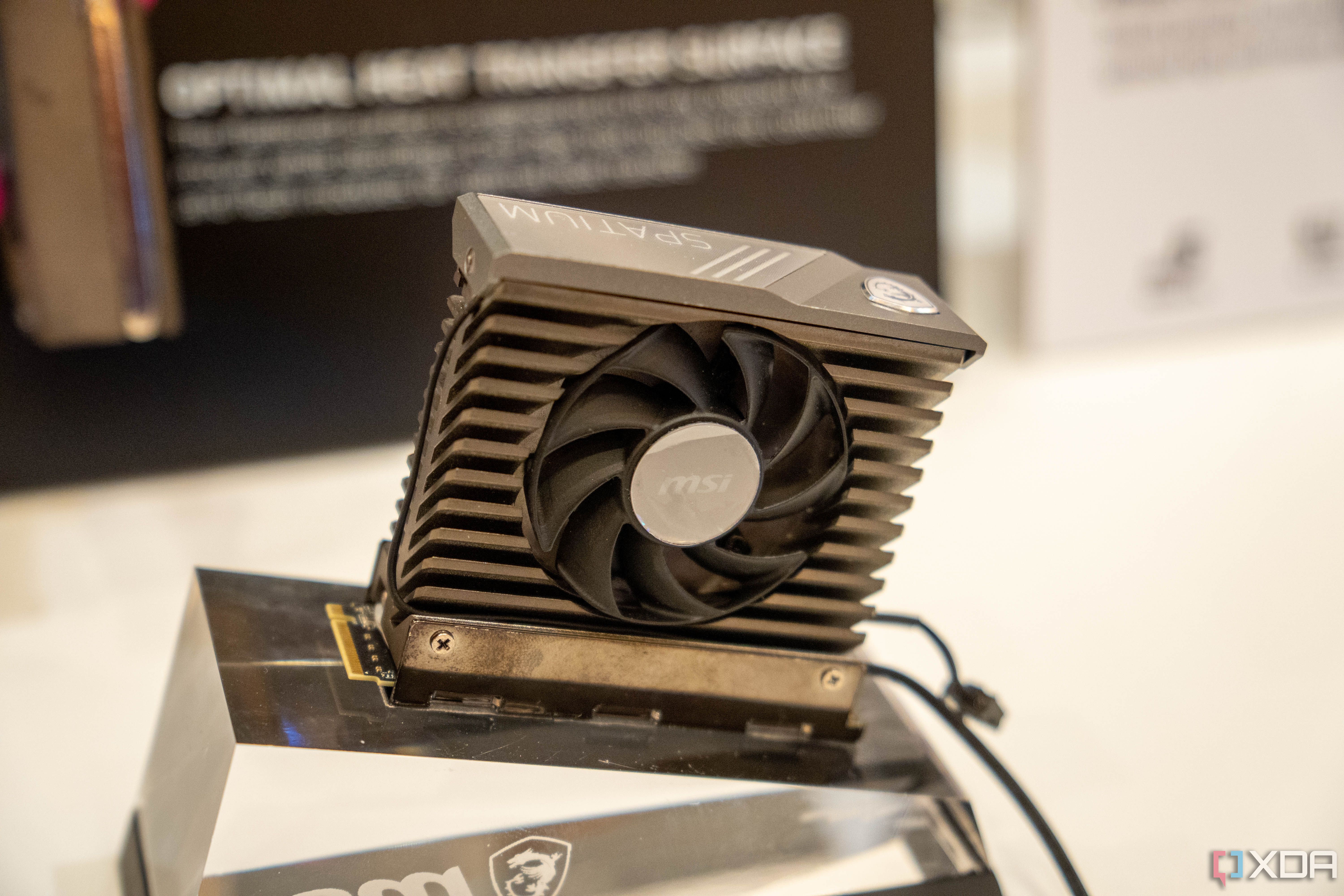 A variety of MSI SSDs placed on a surface.